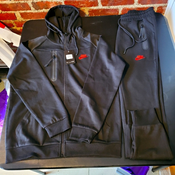 red and black nike tech sweatsuit